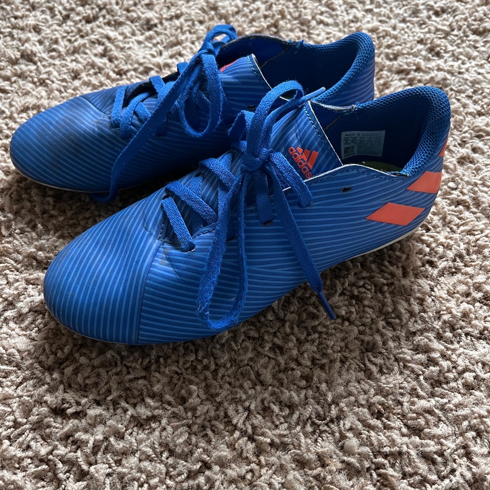 adidas Kids Royal Blue cleats with Orange Logo